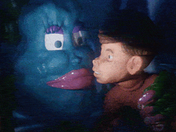 a blue humanoid creature Fungela licking a boy Dooper